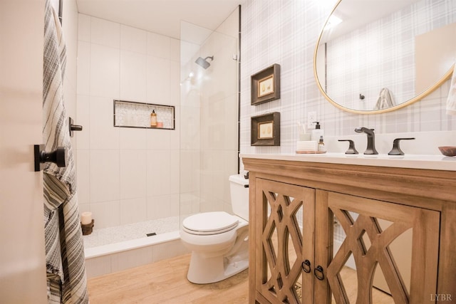 1926 Canterbury Ct Unit 301, Lynchburg, VA 24503 - bathroom featuring vanity, a tile shower, toilet, and tile walls