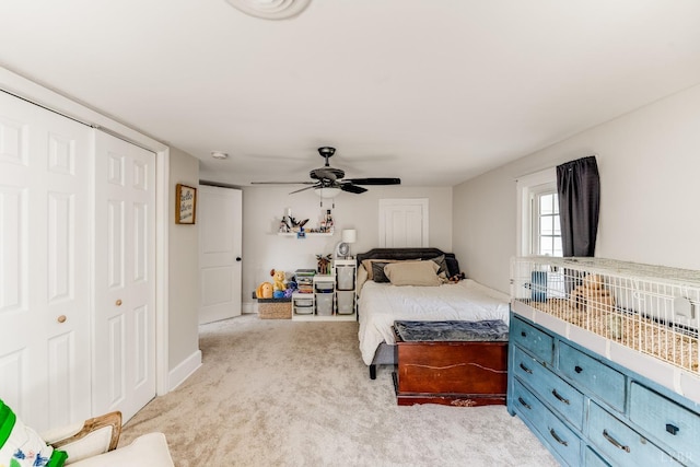 1038 Valencia Dr, Huddleston, VA 24101 - bedroom featuring light carpet, a closet, and a ceiling fan