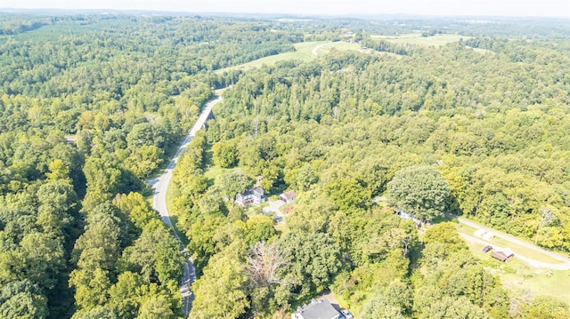 1038 Valencia Dr, Huddleston, VA 24101 - aerial overview of property's location featuring a heavily wooded area