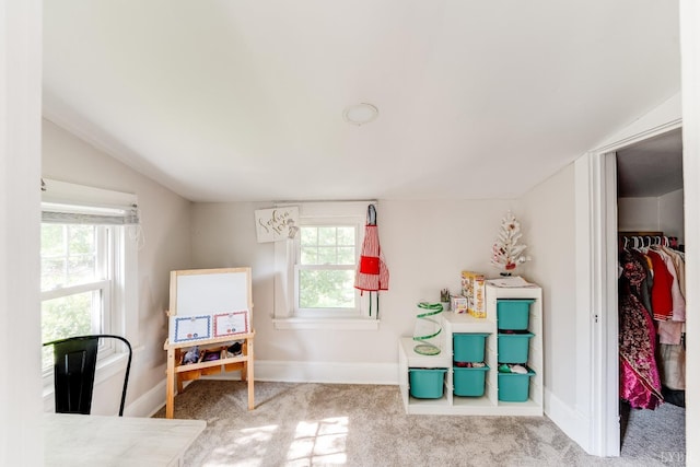1038 Valencia Dr, Huddleston, VA 24101 - game room with lofted ceiling, carpet, baseboards, and healthy amount of natural light