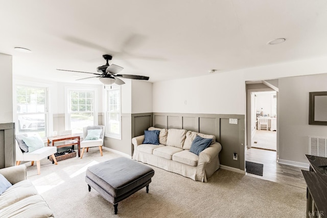 1038 Valencia Dr, Huddleston, VA 24101 - carpeted living room featuring a ceiling fan