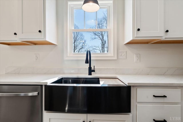 2802 Liberty Chapel Rd, Appomattox, VA 24522 - kitchen featuring dishwasher, a sink, white cabinets, and light stone countertops
