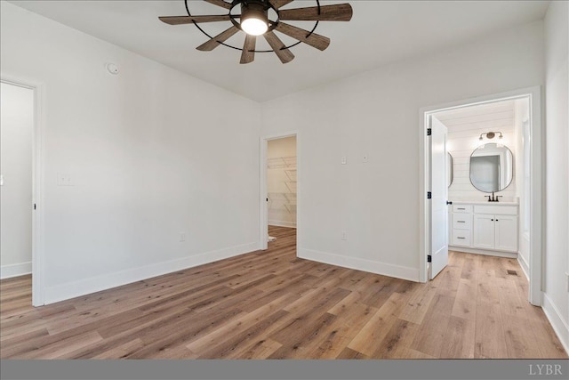 2802 Liberty Chapel Rd, Appomattox, VA 24522 - unfurnished bedroom featuring light wood-style floors, baseboards, and ensuite bathroom