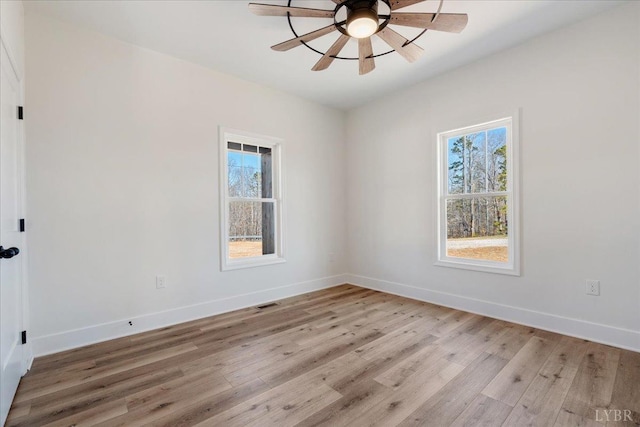 2802 Liberty Chapel Rd, Appomattox, VA 24522 - empty room featuring ceiling fan, light wood finished floors, and baseboards