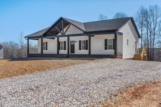 2802 Liberty Chapel Rd, Appomattox, VA 24522 - modern farmhouse with a porch and gravel driveway