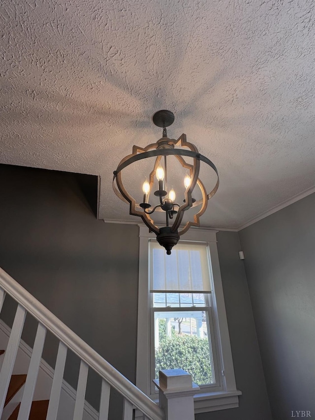 318 Westover Blvd, Lynchburg, VA 24501 - room details featuring crown molding, a textured ceiling, and a notable chandelier