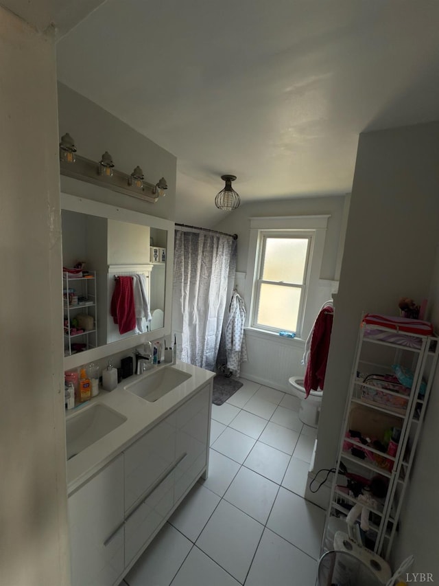 318 Westover Blvd, Lynchburg, VA 24501 - full bath with toilet, double vanity, and tile patterned flooring