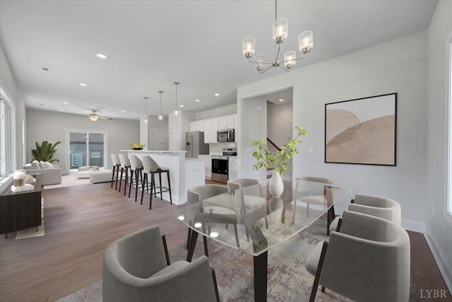 38 Shotman Rd, Rustburg, VA 24502 - living room with wood finished floors, a ceiling fan, recessed lighting, and a chandelier