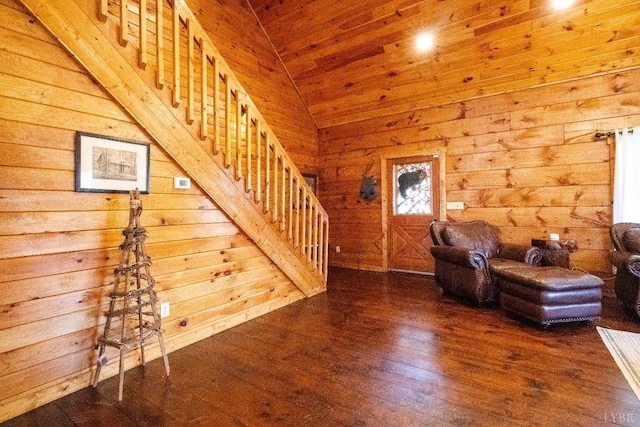 1582 Venturous Trl, Goode, VA 24556 - unfurnished living room featuring wood walls, stairway, vaulted ceiling, wood ceiling, and wood-type flooring