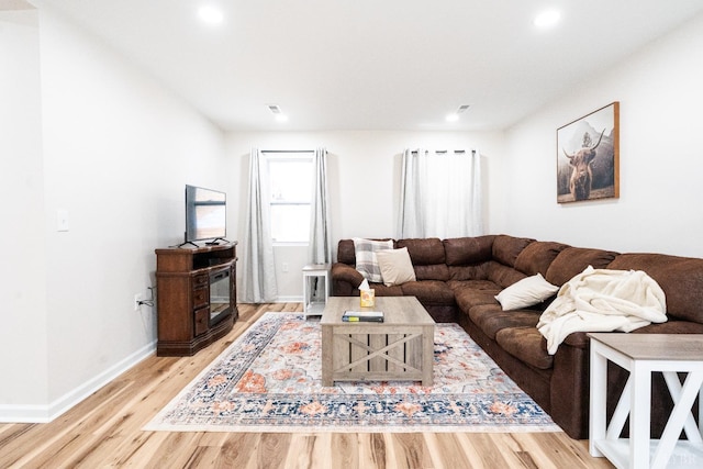 1582 Venturous Trl, Goode, VA 24556 - living room featuring light wood finished floors, baseboards, and recessed lighting