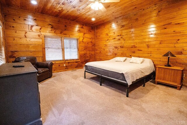 1582 Venturous Trl, Goode, VA 24556 - bedroom with wood ceiling, light carpet, wooden walls, ceiling fan, and recessed lighting