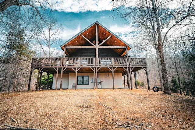 view of front facade featuring a wooden deck