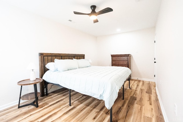 1582 Venturous Trl, Goode, VA 24556 - bedroom featuring baseboards, visible vents, light wood-style floors, and ceiling fan