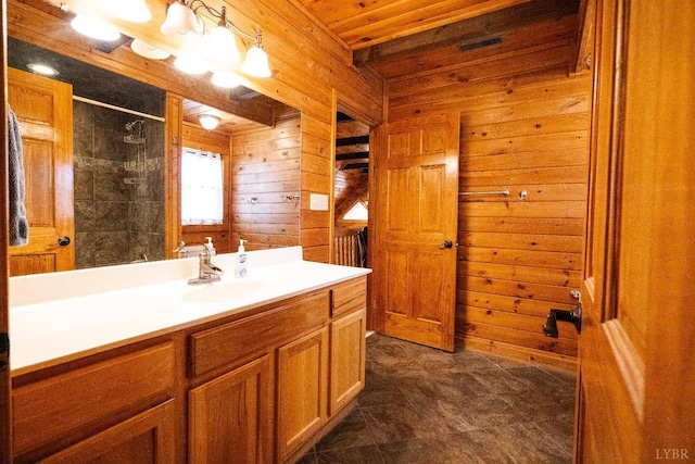 1582 Venturous Trl, Goode, VA 24556 - bathroom with vanity, a tile shower, and wooden walls