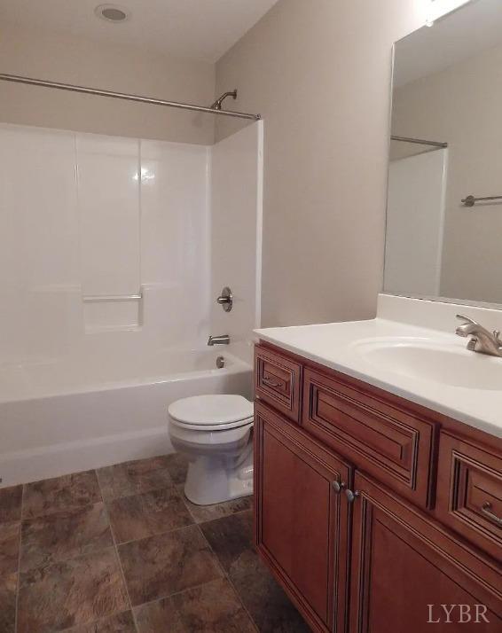 289 Todd Ln, Madison Heights, VA 24572 - full bathroom featuring toilet, vanity, and bathing tub / shower combination