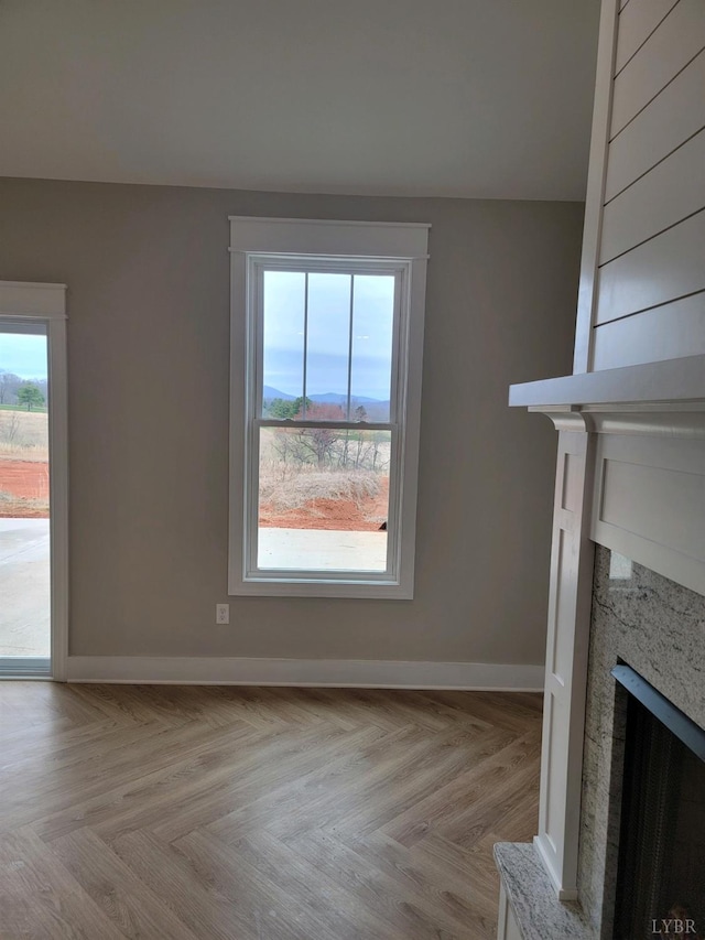 43 Grandset Dr, Forest, VA 24551 - unfurnished living room featuring a fireplace and baseboards