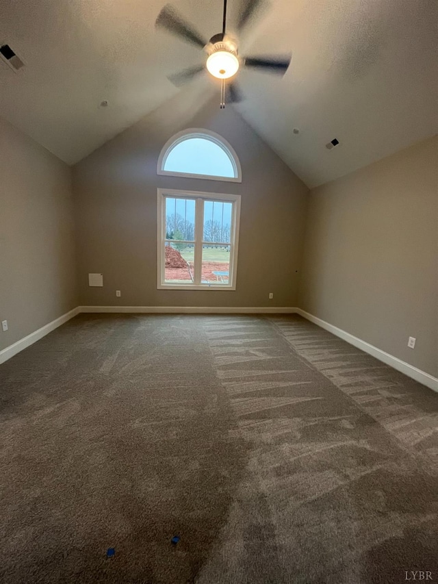 43 Grandset Dr, Forest, VA 24551 - spare room featuring ceiling fan, vaulted ceiling, dark colored carpet, baseboards, and a textured ceiling