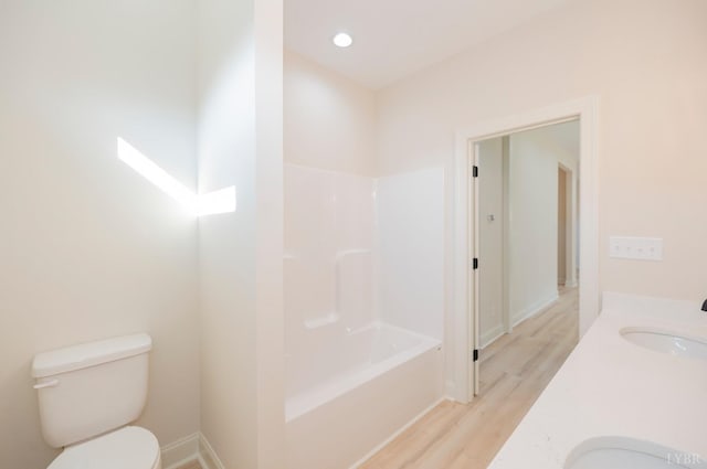 4 Live Oak Dr, Forest, VA 24551 - bathroom featuring a sink, toilet, double vanity, baseboards, and wood finished floors