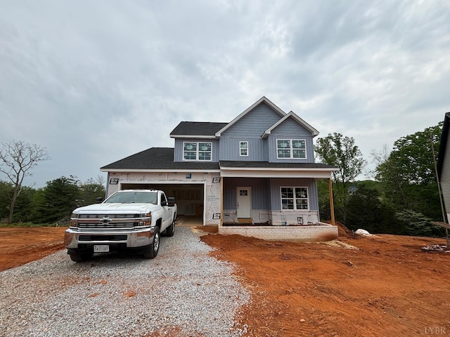 4 Live Oak Dr, Forest, VA 24551 - unfinished property with covered porch, gravel driveway, and an attached garage