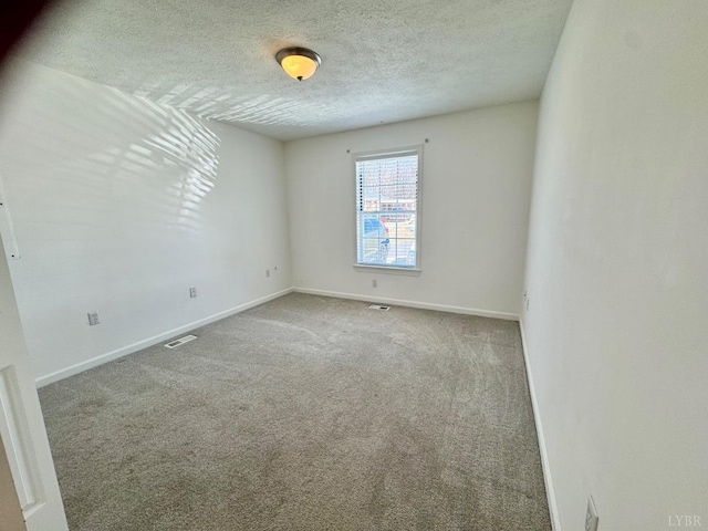 2809 Herbert St, Lynchburg, VA 24501 - empty room featuring baseboards, carpet flooring, and a textured ceiling
