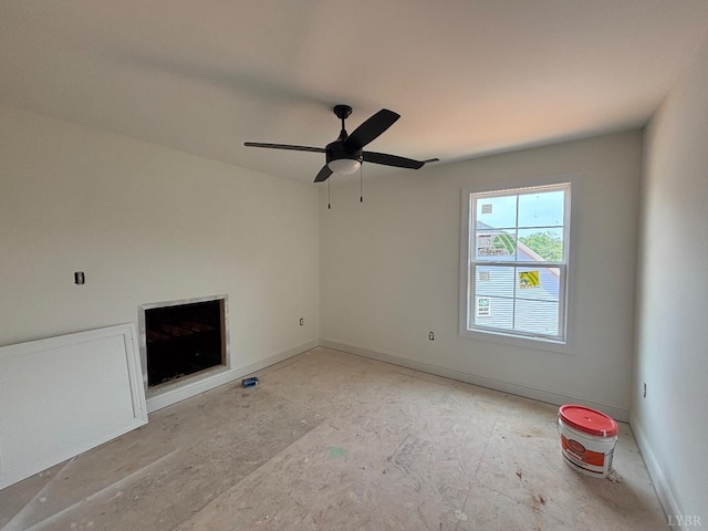 5 Live Oak Dr, Forest, VA 24551 - unfurnished living room featuring ceiling fan and baseboards