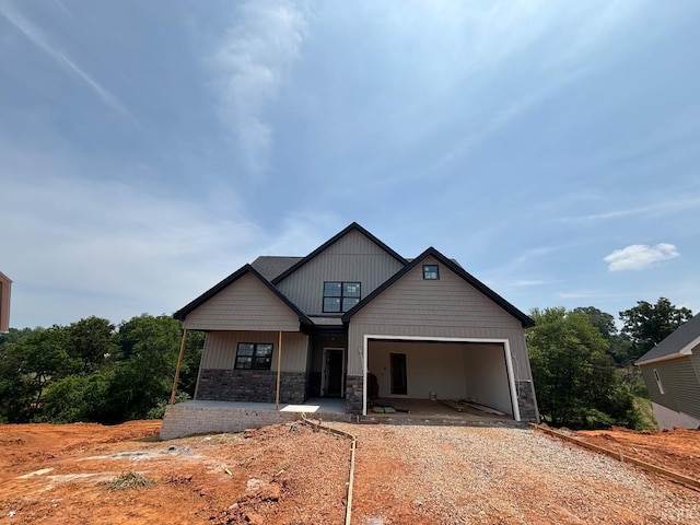 5 Live Oak Dr, Forest, VA 24551 - craftsman inspired home with driveway, stone siding, a garage, and covered porch