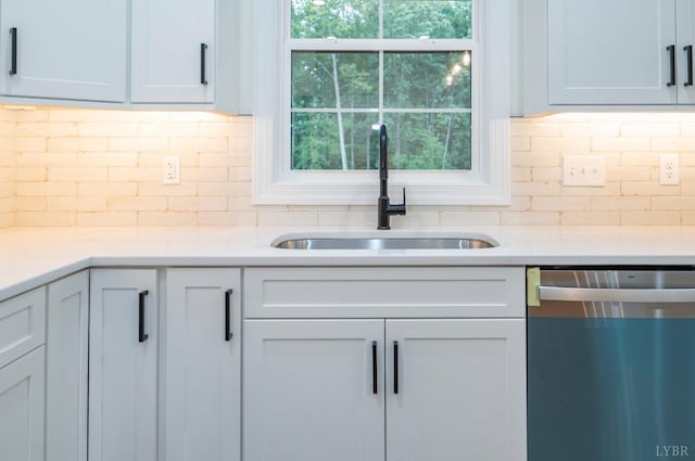 5 Live Oak Dr, Forest, VA 24551 - kitchen with white cabinetry, decorative backsplash, a sink, light countertops, and dishwasher