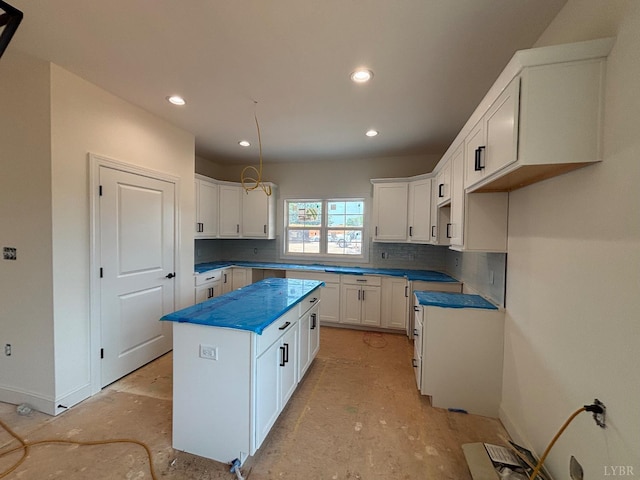 5 Live Oak Dr, Forest, VA 24551 - kitchen with a center island, backsplash, white cabinetry, recessed lighting, and dark countertops