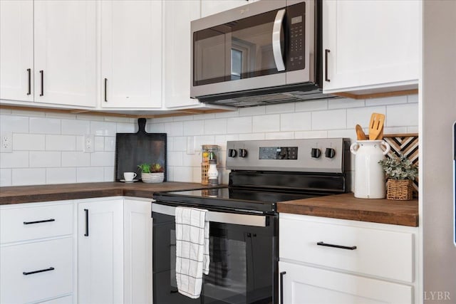 119 Ves Rd, Lynchburg, VA 24503 - kitchen featuring stainless steel appliances, wood counters, white cabinets, and backsplash