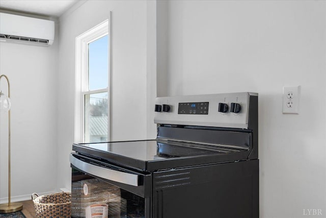 1209 15th St, Lynchburg, VA 24504 - room details with a wall unit AC, baseboards, and stainless steel electric range