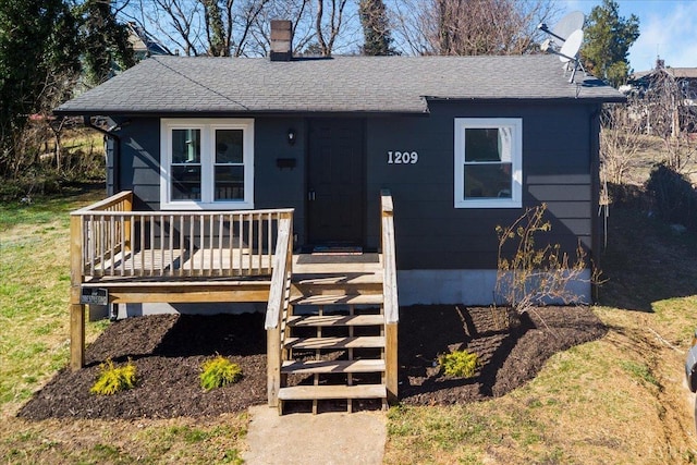 1209 15th St, Lynchburg, VA 24504 - view of front of property with a chimney, a deck, roof with shingles, and a front yard