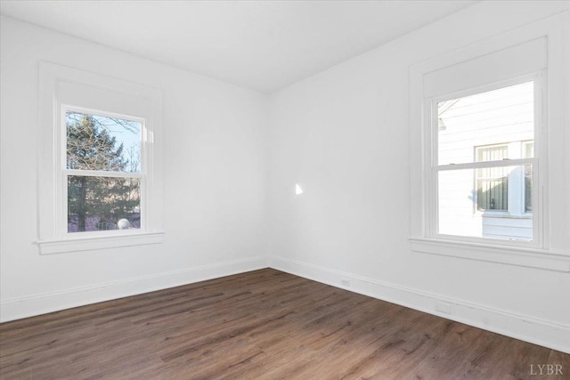 319 Kemper Rd, Danville, VA 24541 - spare room with dark wood-style flooring and baseboards