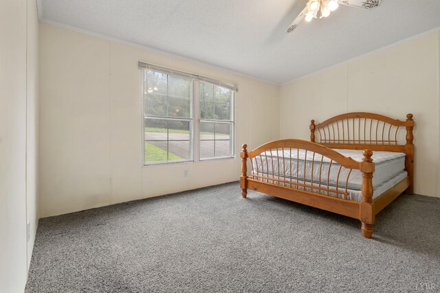 550 Mitchell Rd, Axton, VA 24054 - carpeted bedroom featuring ceiling fan and ornamental molding