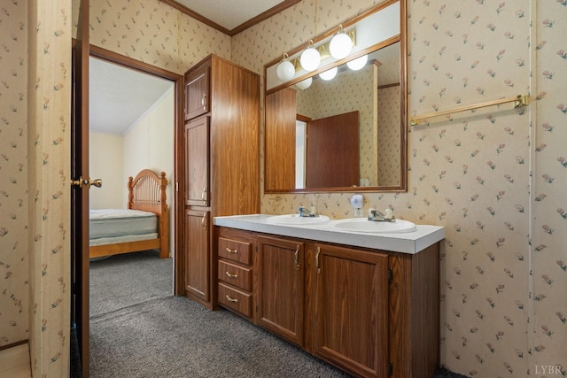 550 Mitchell Rd, Axton, VA 24054 - bathroom featuring ornamental molding, a sink, ensuite bath, wallpapered walls, and double vanity