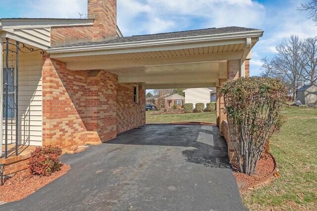 337 Virginia Ave, Appomattox, VA 24522 - view of parking / parking lot with driveway and a carport