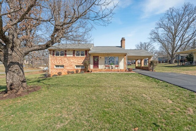 337 Virginia Ave, Appomattox, VA 24522 - split level home with a chimney, brick siding, driveway, a porch, and an attached carport
