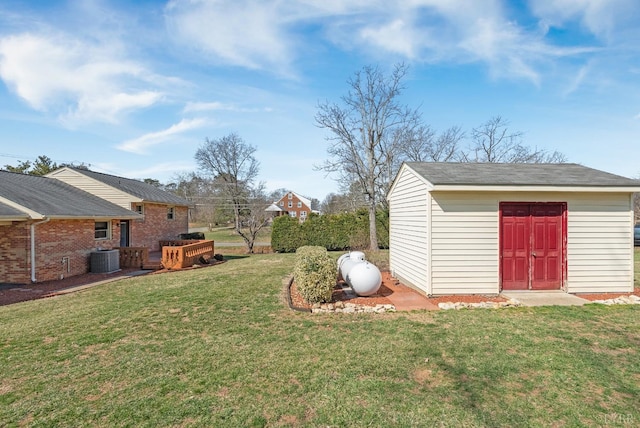 337 Virginia Ave, Appomattox, VA 24522 - view of grassy yard with an outdoor structure and central AC unit