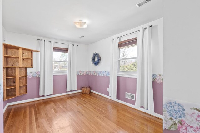 337 Virginia Ave, Appomattox, VA 24522 - spare room featuring wood finished floors and baseboards