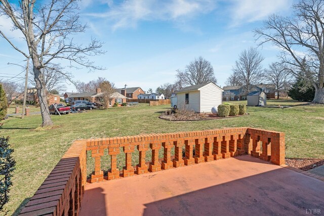 337 Virginia Ave, Appomattox, VA 24522 - wooden deck with an outbuilding, a lawn, a residential view, and a shed