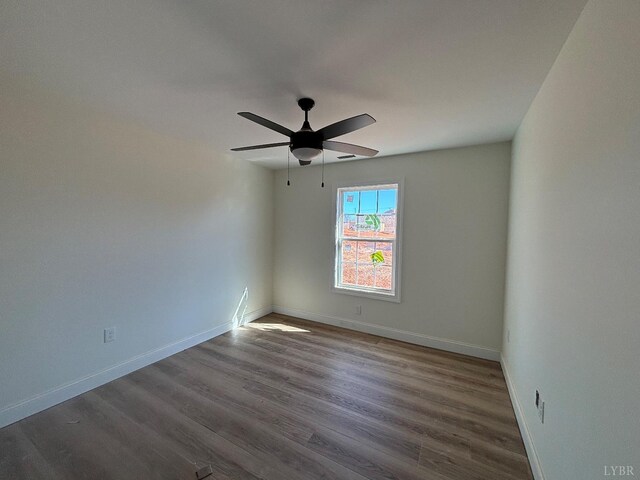 1018 Misty Mountain Rd, Lynchburg, VA 24502 - spare room featuring baseboards, wood finished floors, and a ceiling fan