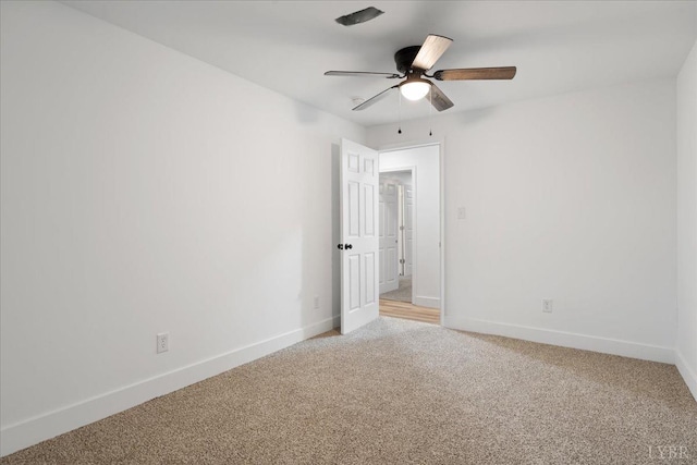 623 Monroe St, Lynchburg, VA 24504 - unfurnished bedroom with light carpet, baseboards, and ceiling fan