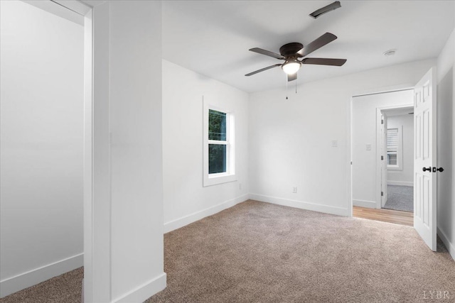 623 Monroe St, Lynchburg, VA 24504 - unfurnished bedroom featuring light colored carpet, baseboards, and ceiling fan