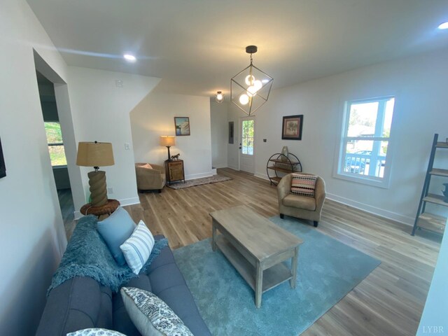623 Monroe St, Lynchburg, VA 24504 - living area featuring wood finished floors, baseboards, and recessed lighting