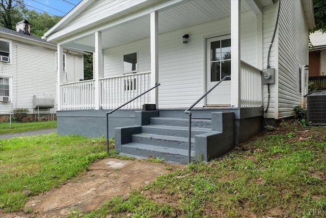 623 Monroe St, Lynchburg, VA 24504 - property entrance with covered porch, heating fuel, and cooling unit