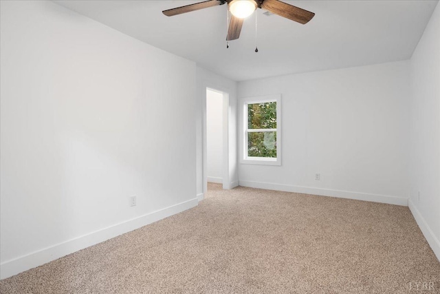 623 Monroe St, Lynchburg, VA 24504 - empty room featuring light carpet, baseboards, and a ceiling fan