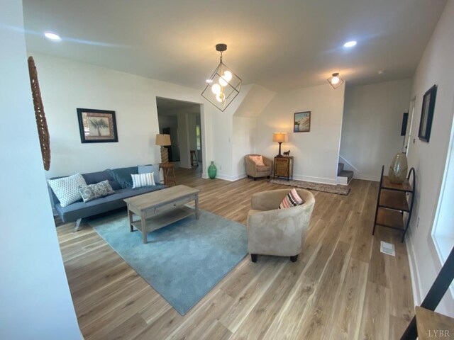 623 Monroe St, Lynchburg, VA 24504 - living room with wood finished floors, stairs, baseboards, and recessed lighting