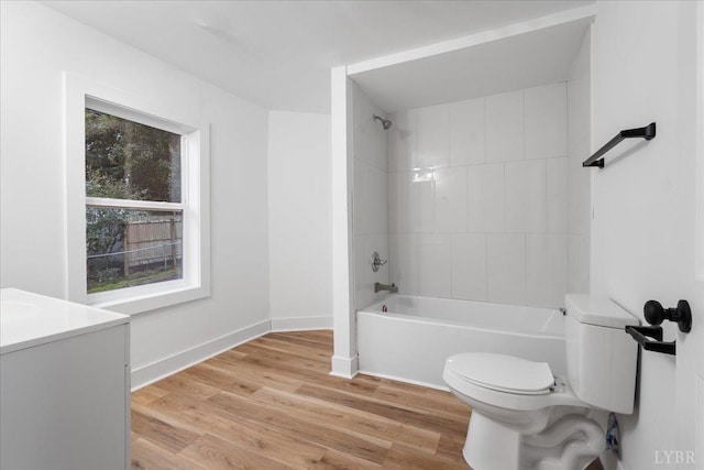 623 Monroe St, Lynchburg, VA 24504 - full bathroom featuring toilet, wood finished floors, shower / tub combination, baseboards, and vanity