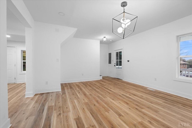 623 Monroe St, Lynchburg, VA 24504 - unfurnished room with light wood-style flooring and baseboards