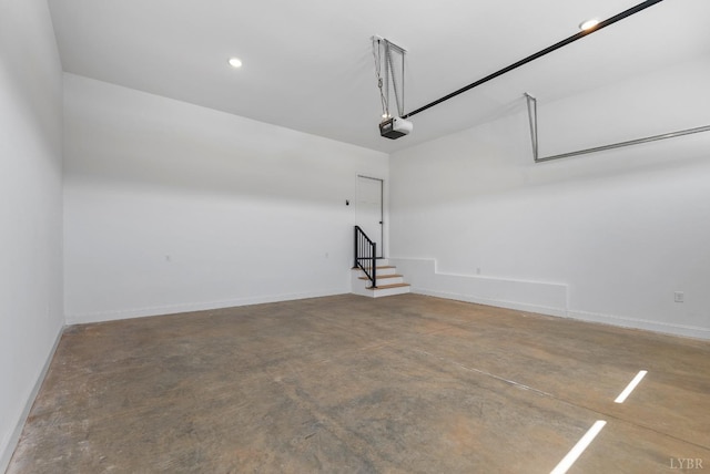 2135 Bellevue Rd, Forest, VA 24551 - garage with a garage door opener and baseboards