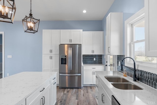 2135 Bellevue Rd, Forest, VA 24551 - kitchen with stainless steel fridge with ice dispenser, light stone countertops, wood finished floors, white cabinets, and pendant lighting